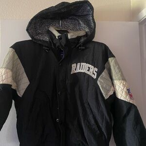 Vintage Raiders Starter Jacket Large Black Hood Zip all the way up.